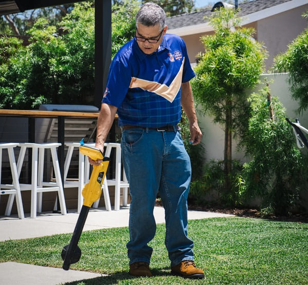 A Leak Hounds leak detection technician finding underground leaks